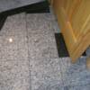 Completed master bathroom floor with granite